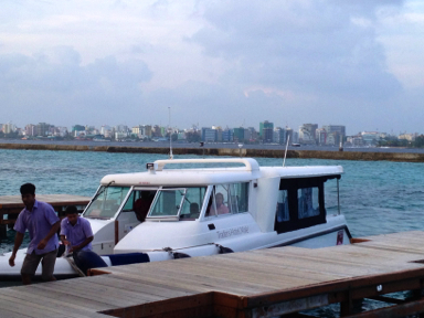 Capital Island of Male bending airport boat transfer